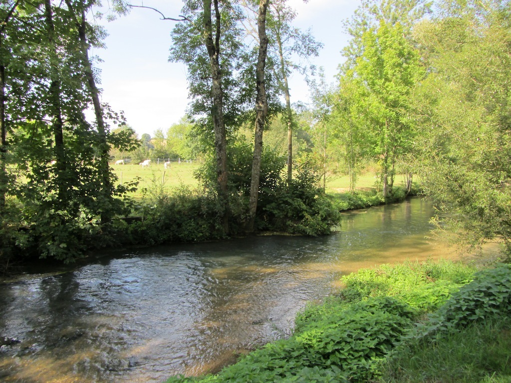 the Meuse and the Canal de lEst slowly pass thru town
