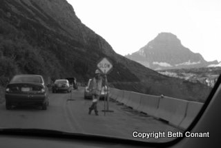 Workpeople pose on the road.