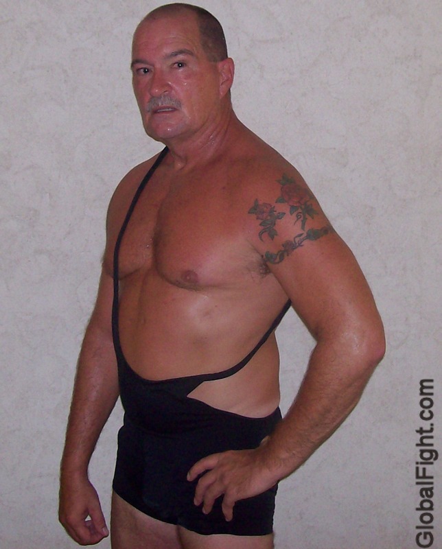 bald tanned older wrestler.jpeg
