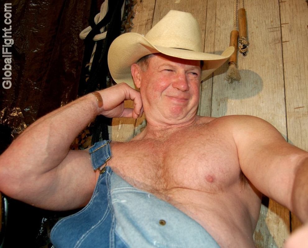 biceps cowboy daddy flexing.jpg