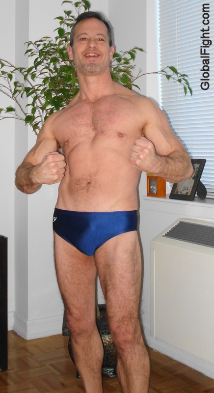 speedos muscle dude flexing.jpg