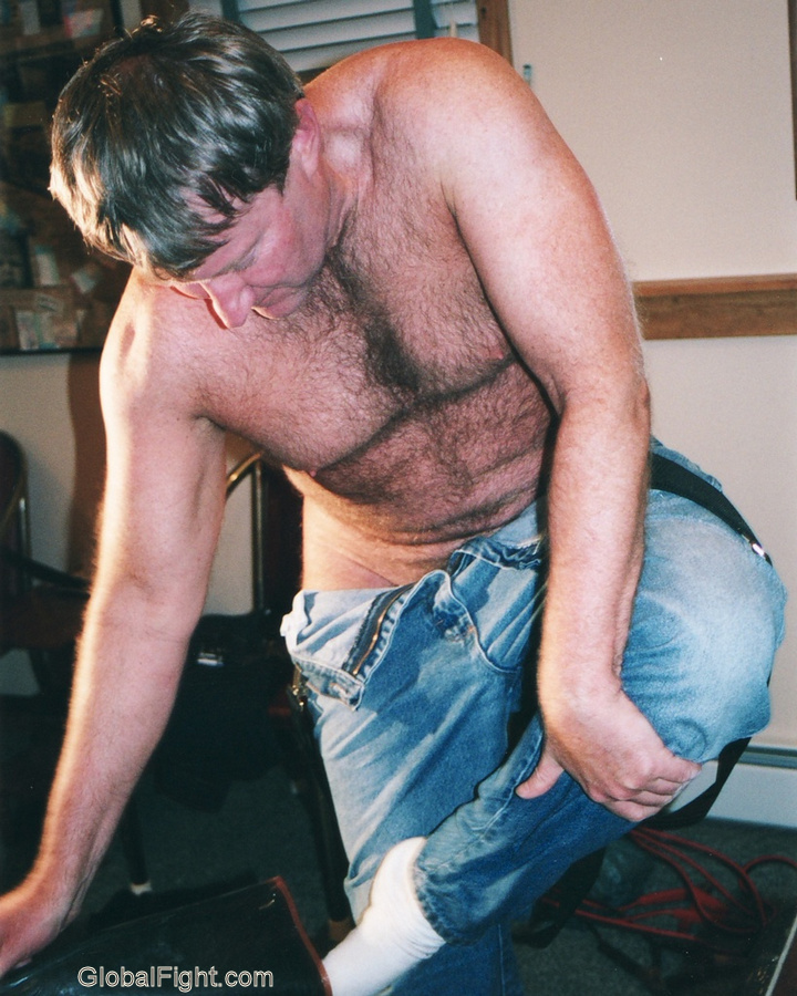 drunk mardi gras man taking off removing pants.JPG