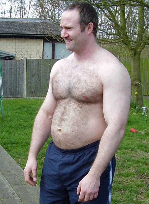 hot bear cub gym shorts backyard yardwork.jpeg