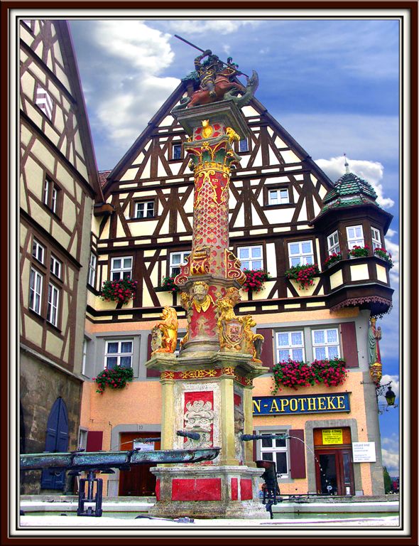 Old Fountain On Central Square, Rothenburg,Germany