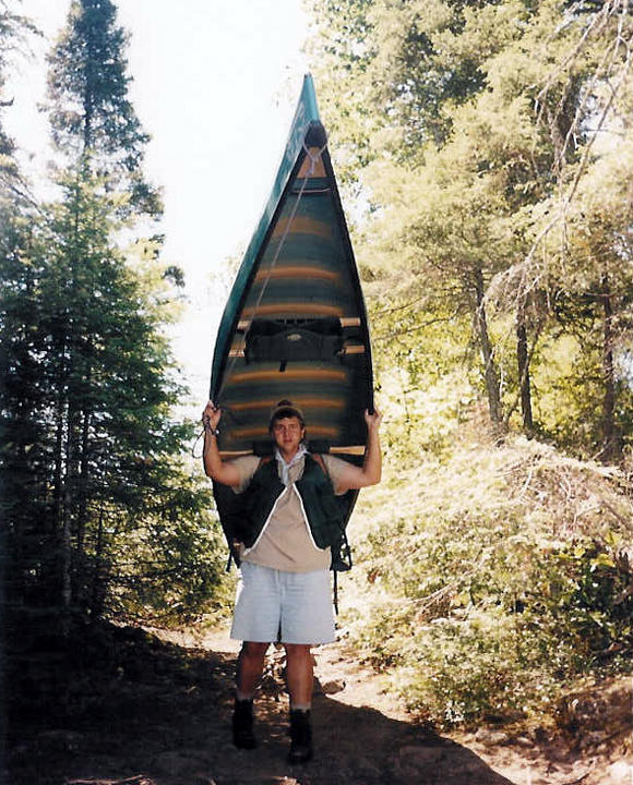 Me Portaging the Quetico 16 on Numbered Lakes.jpg