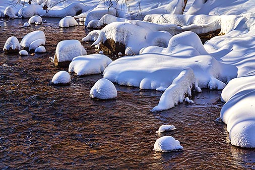 Snow-Covered River Rocks 32625