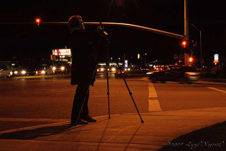Photographer On The Corner