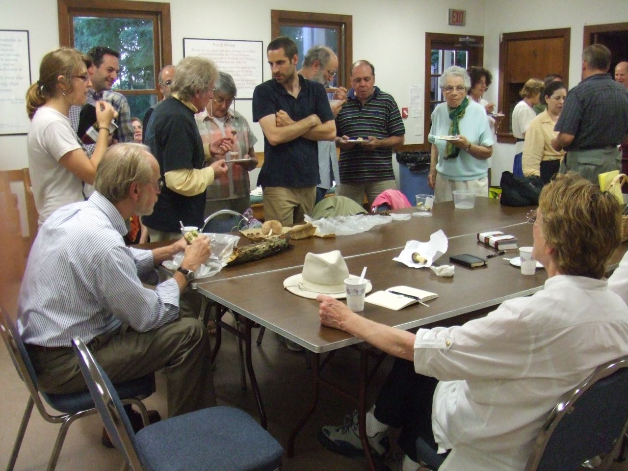 Gary Lincoff talks with Carol Levine about a mushroom collected, while others listen in. 0753.jpg