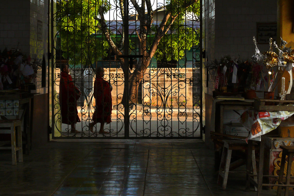 Monks on their alms route in the morning.jpg