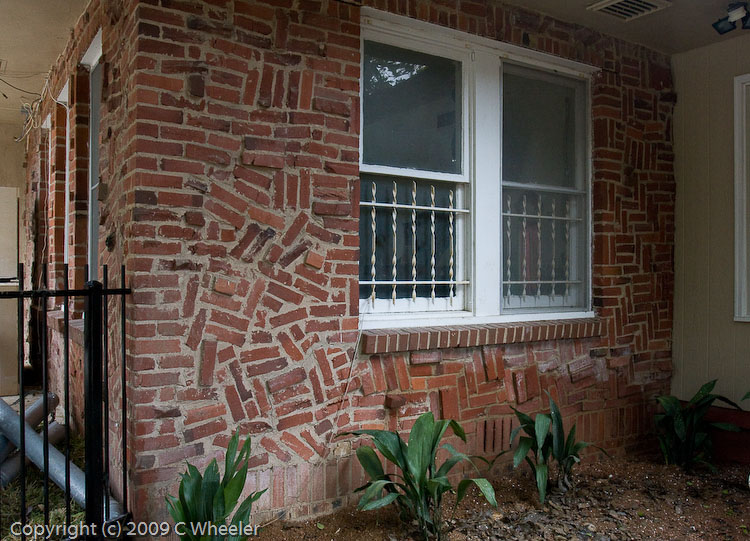 The brick on our house before we painted it.