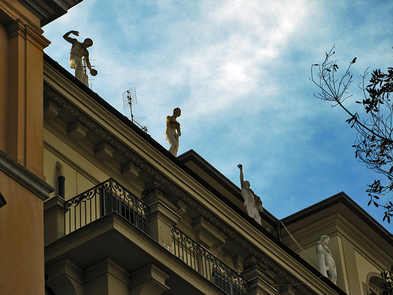 On a rooftop, classical statues9972