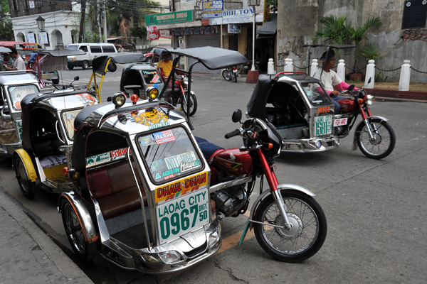 Tricycles have mostly replaced the Kalesas in Laoag City