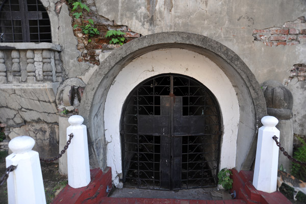 ...the 400 year old bell tower has sunk so much one must now bend over to enter