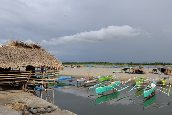 Thatched hut along the river, La Paz