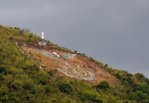 A giant Philippine medical emblem on Agila hill above Culion