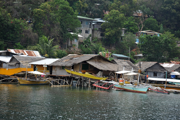 I was hoping our boatman would sail around the huts on the south side of Culion...