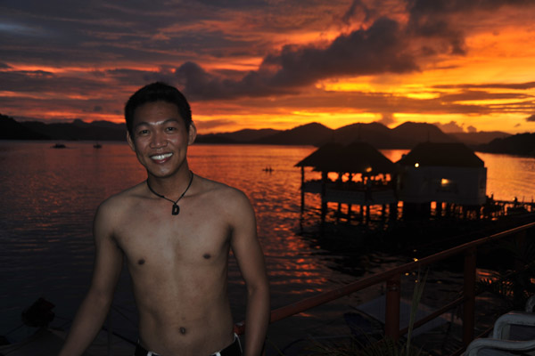 Dennis with the sunset from the upper deck of Seadive Resort, Coron Town