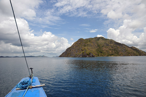 Smooth waters of Coron Bay with Sangat Island