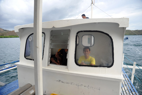 Dennis driving the boat back to Coron Town