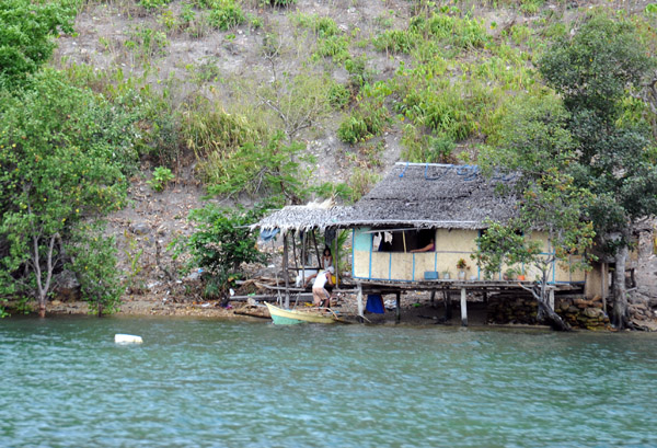 Lonely fisherman's hut on the north shore of Uson Island