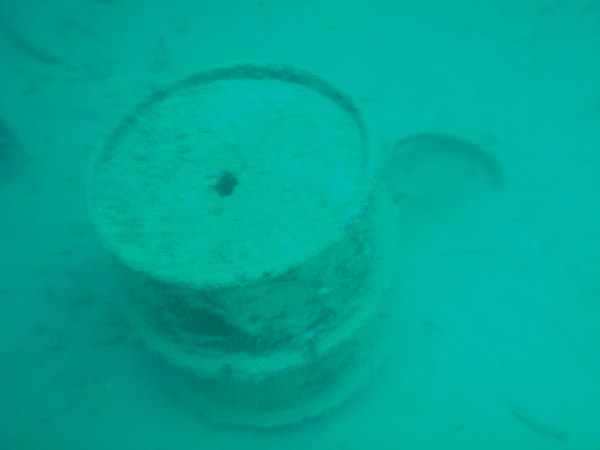 Barrels in the hold of Olympia Maru