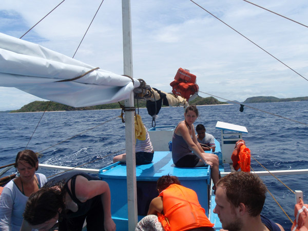 ...perhaps it was to help us dry off or to help the small boat handle the wind better