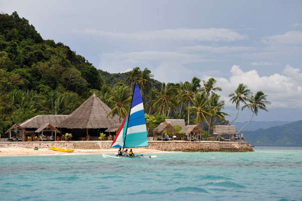 Pangulasian Island with an  El Nido Resorts sailboat