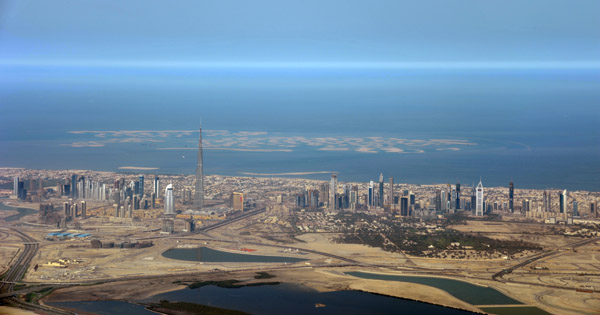 The tail end of Dubai Creek with the Dubai Skyline and The World