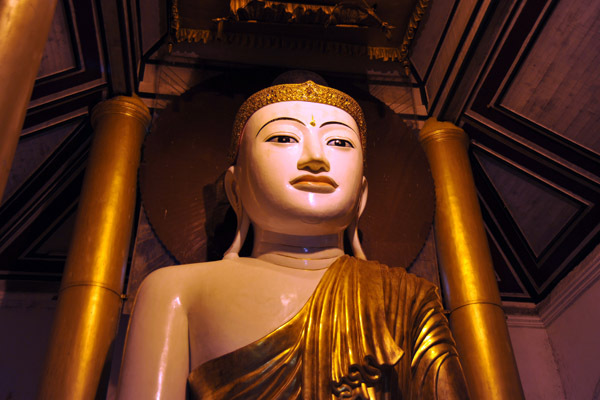 Colossal seated Buddha at night, Shwedagon Paya