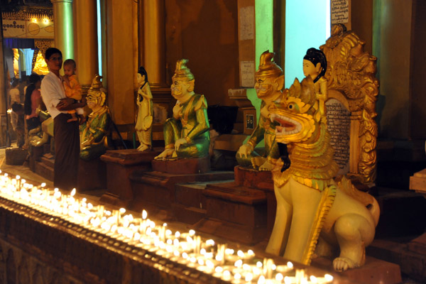 Low candle covered wall encircling the main stupa, Shwedagon Paya