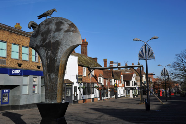 The Golden Tree sculpture sits on the site of Crawley's old market cross 