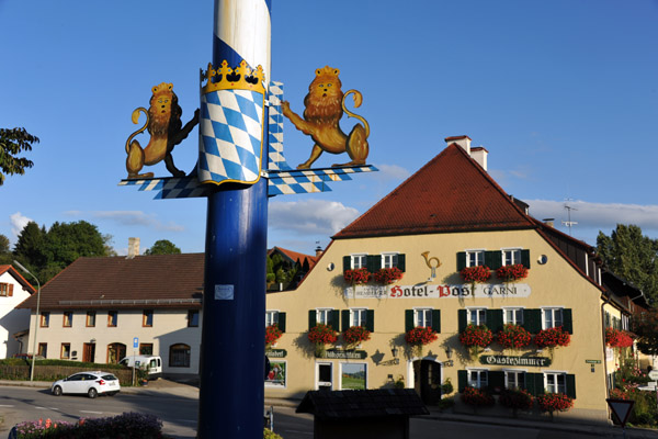 Maypole in Andechs in front of the Hotel Zur Post