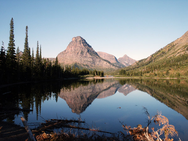 Early Morning, Two Medicine Lake with Sinopah Mountain reflecting in the still water, Glacier National Park
