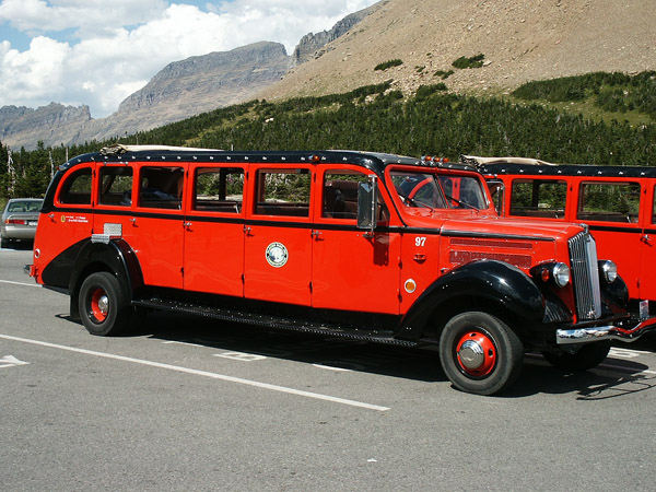 1930s red touring busses, Glacier National Park