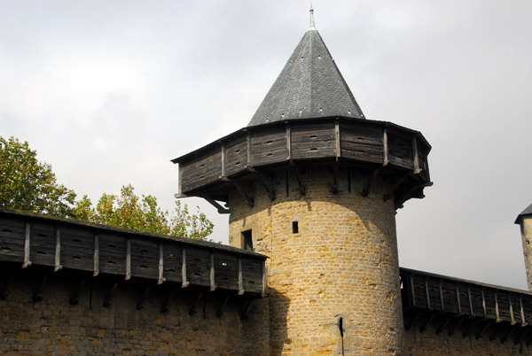 Tour des Casernes with reconstructed defensive galleries (hoarding)