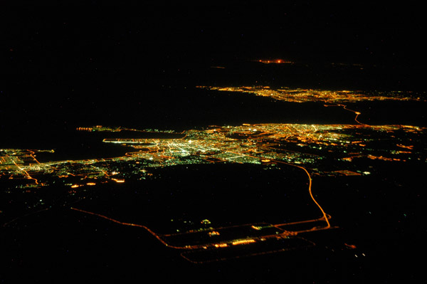 Dammam with King Fahd International Airport and Bahrain, night