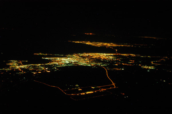 Dammam with King Fahd International Airport and Bahrain, night