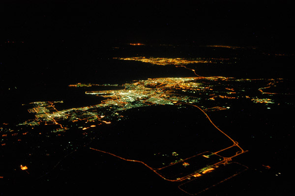 Dammam with King Fahd International Airport and Bahrain, night