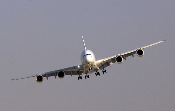 Airbus A380 turning final, gear down, for landing, Dubai
