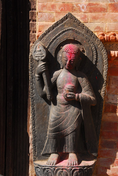 Statue behind Yatkha Bahal stupa