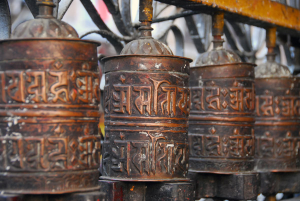 Prayer wheels, Seto Machhendranath Temple (Jan Bahal), near Asan Tole, Kathmandu