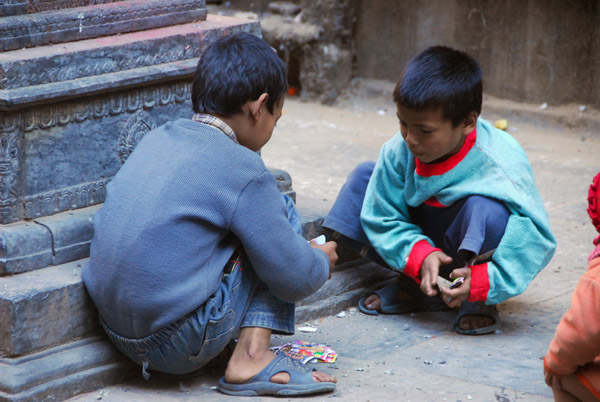 Children playing at game around Jan Bahal, Kathmandu