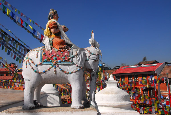 Mounted elephant statue at the steps to Bodhnath Stupa
