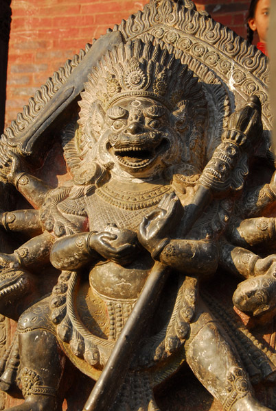 Goddesses Baghini and Singhini atop the steps of Nyatapola Temple