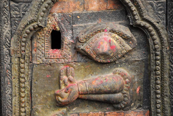 Hole in door for temple offerings, Bhairabnath Temple, Taumadhi Tole, Bhaktapur