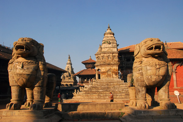 Stone lions east of Durbar Square with Siddhi Lakshimi Temple