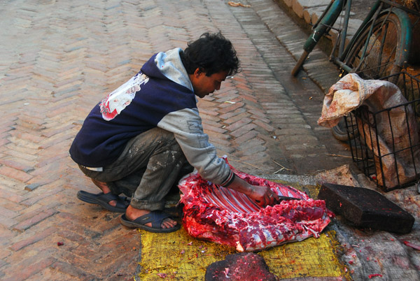 Sidewalk butcher at work, Bhaktapur
