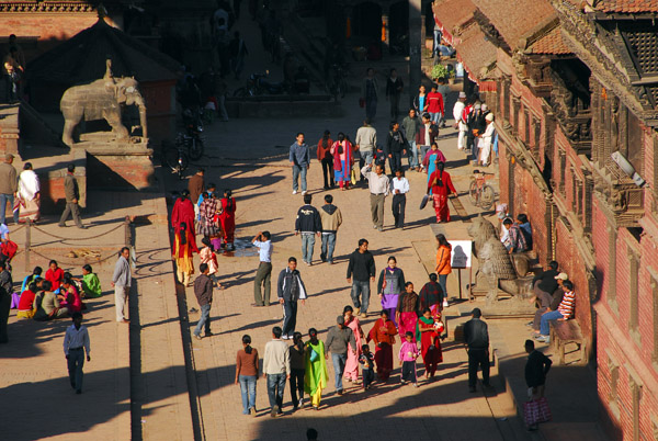 Colorfully dressed visitors to Durbar Square, Patan