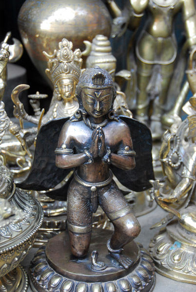 Garuda, around 5500 rupees ($85) but too heavy