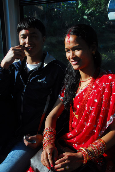 Nepali couple sharing the cable car gondola with me